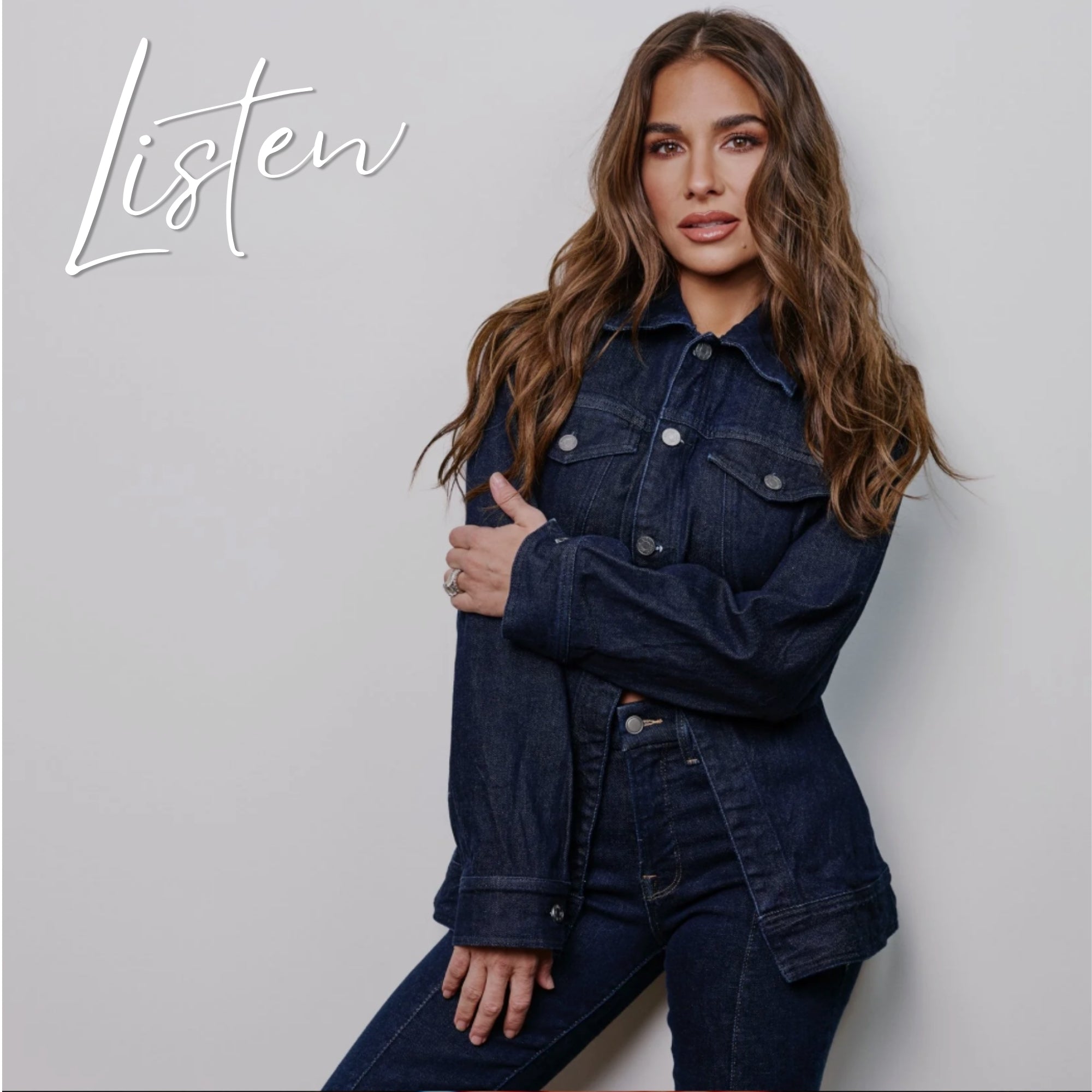 Jessie wearing a denim outfit with 'Listen' text on a plain background