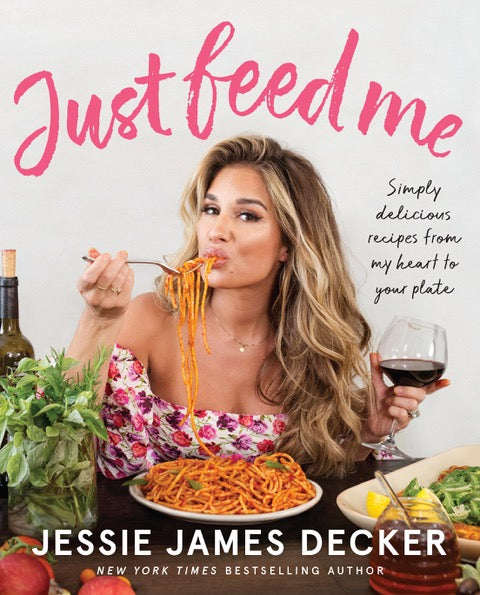 Book cover of 'Just Feed Me' by Jessie James Decker featuring a woman eating pasta.