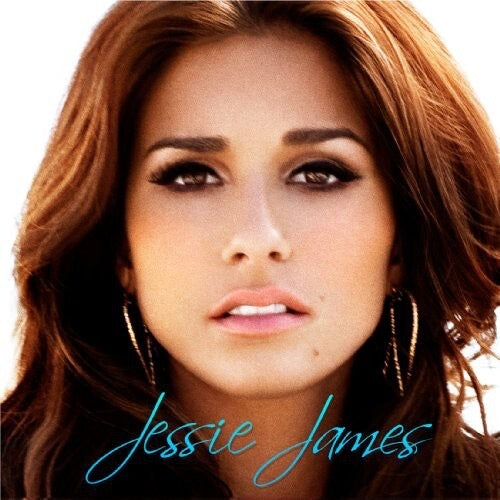 A close-up portrait of a woman with long wavy brown hair, dark eye makeup, and gold hoop earrings, with the text 'Jessie James' in blue script across the lower portion.